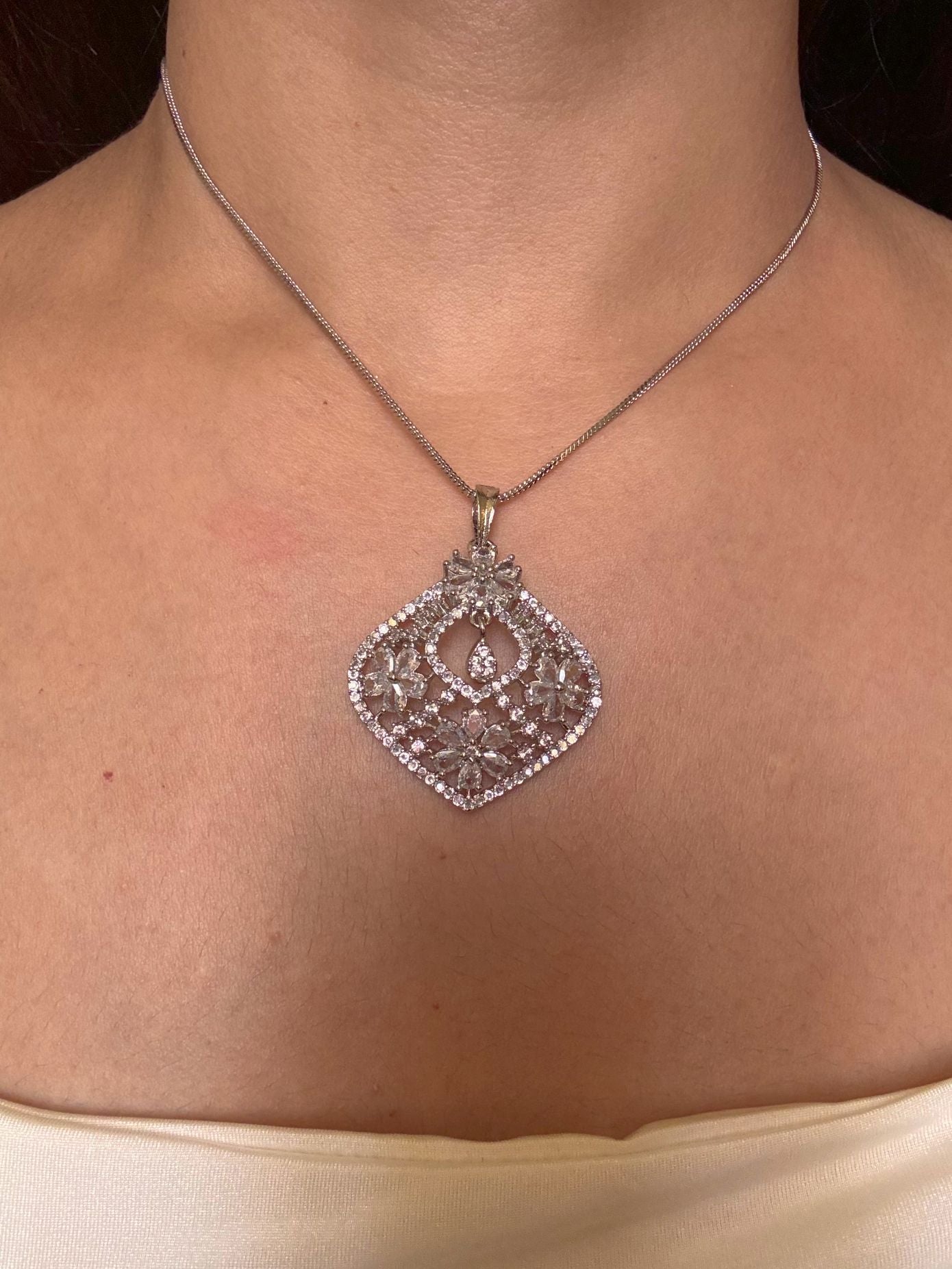 Shop Suhasi Nano Setting AD Pendant Set With Chain Online in India. Pendant sets in different stones like Kundan, Moissanite, CZ stones and AD stones. -front