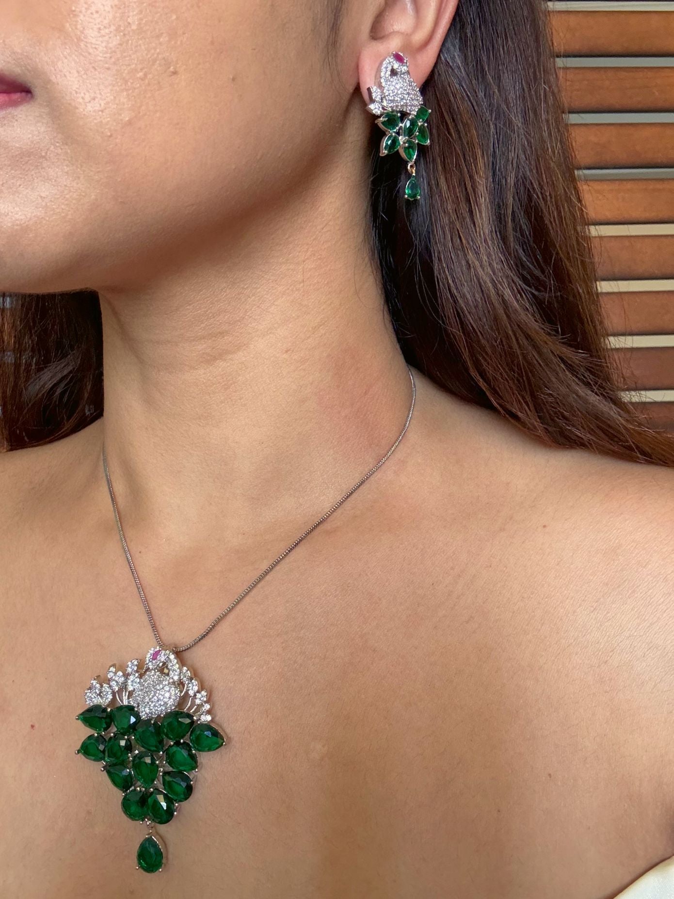 Shop Morni Pendant Set In Green Doublet & AD Stones Online in India. Pendant sets in different stones like Kundan, Moissanite, CZ stones and AD stones. -second