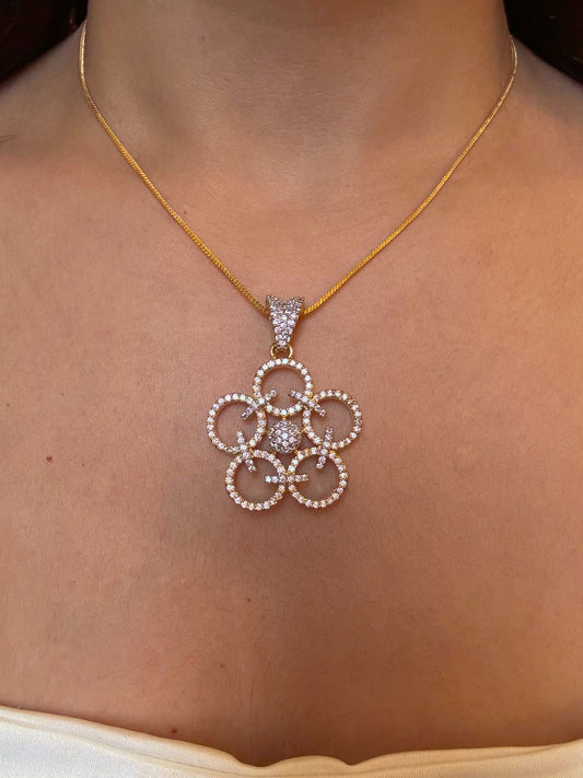 Shop Sunanda Pendant Set With Chain In Gold Polish Online in India. Pendant sets in different stones like Kundan, Moissanite, CZ stones and AD stones. -first
