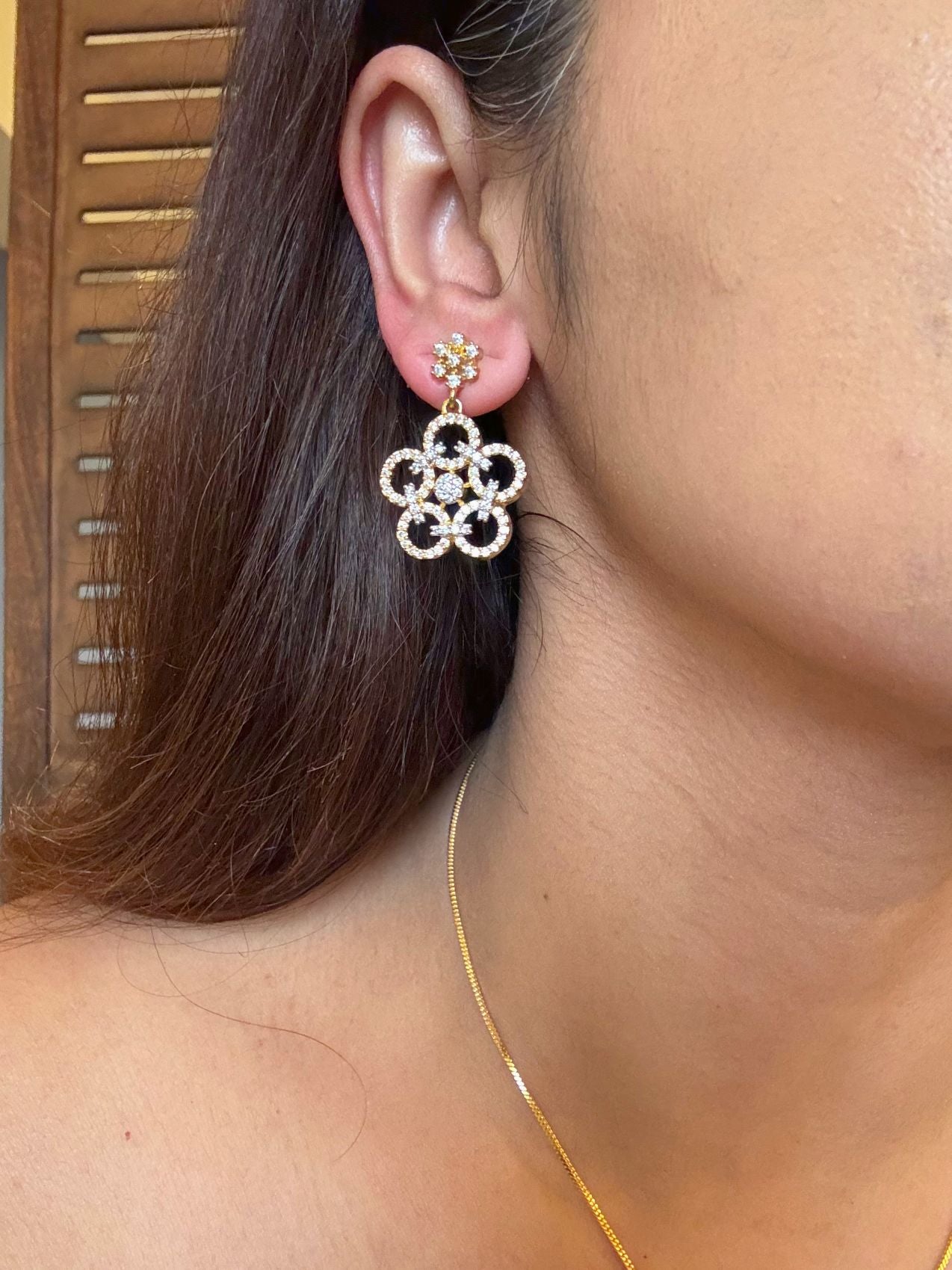 Shop Sunanda Pendant Set With Chain In Gold Polish Online in India. Pendant sets in different stones like Kundan, Moissanite, CZ stones and AD stones. -side