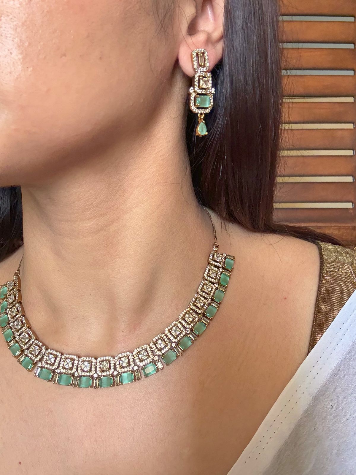 Shop rani mint green antique gold AD necklace set online in India. Shop from an exclusive range of jewellery, gold imitation necklace, brass necklace for weddings. -side