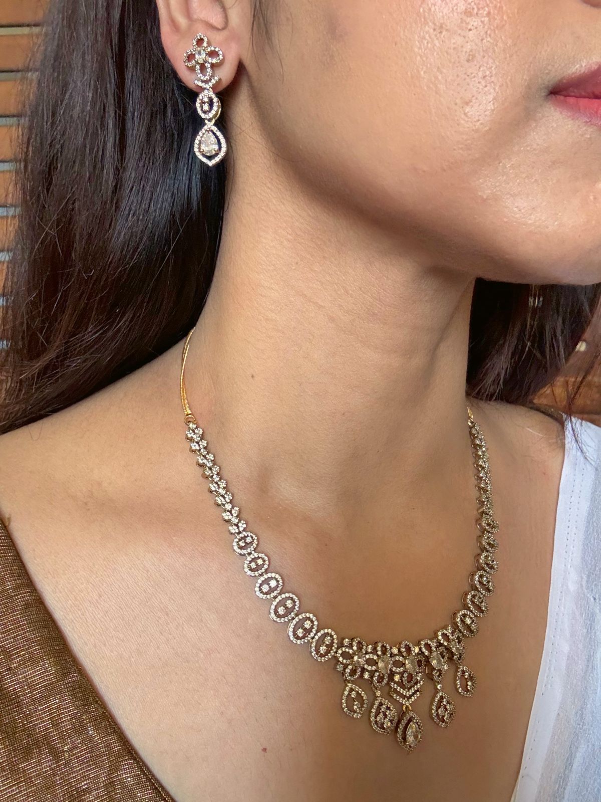 Buy white boond antique gold AD necklace set online in India. Shop from an exclusive range of jewellery, gold imitation necklace, brass necklace for weddings. -full view