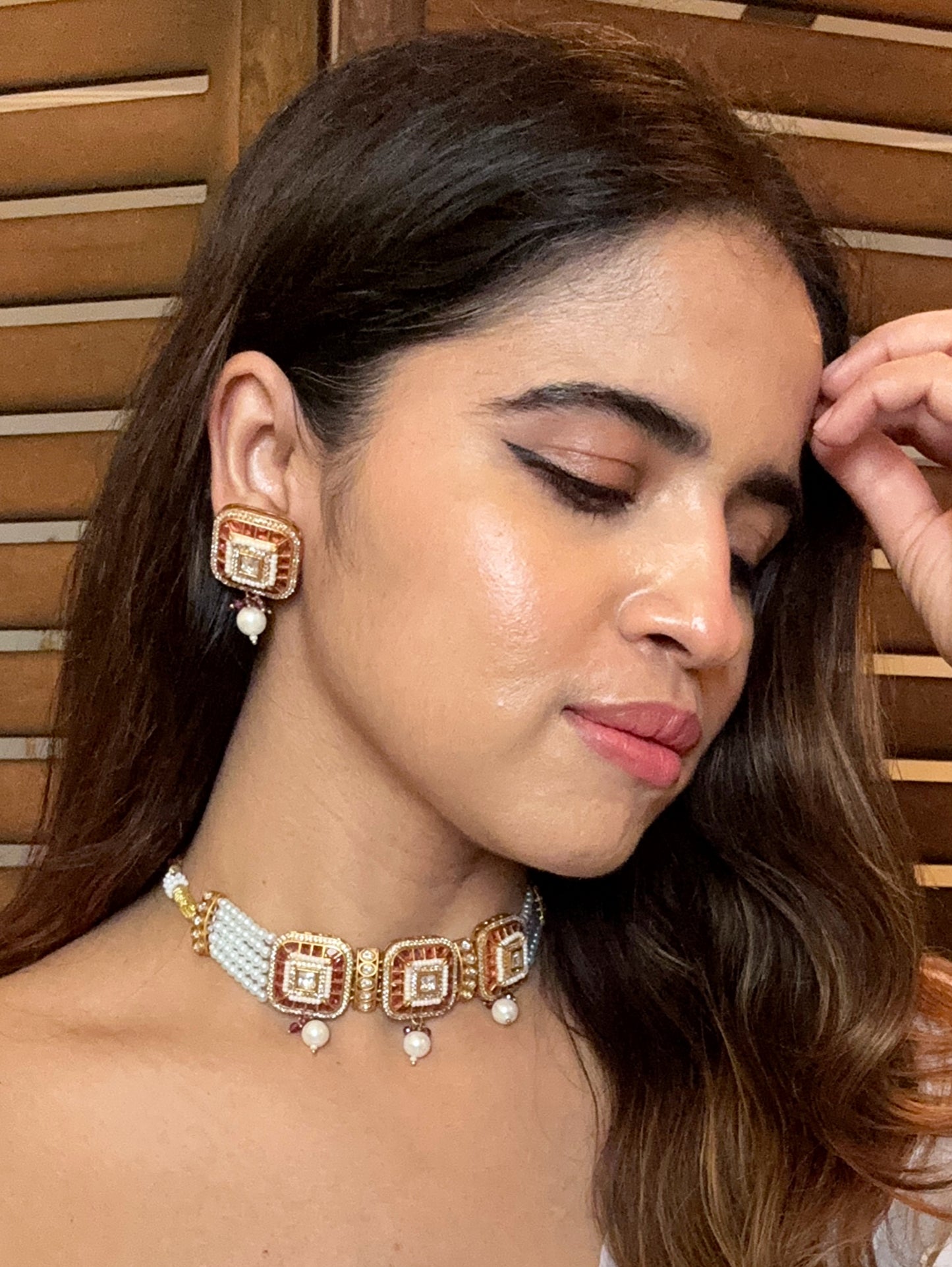 Shop red stone kundan AD pearl choker set online in India. Shop an exclusive range of zircon jewellery, Indian wedding jewelry, kundan jewellery, AD earrings, AD necklace.-side